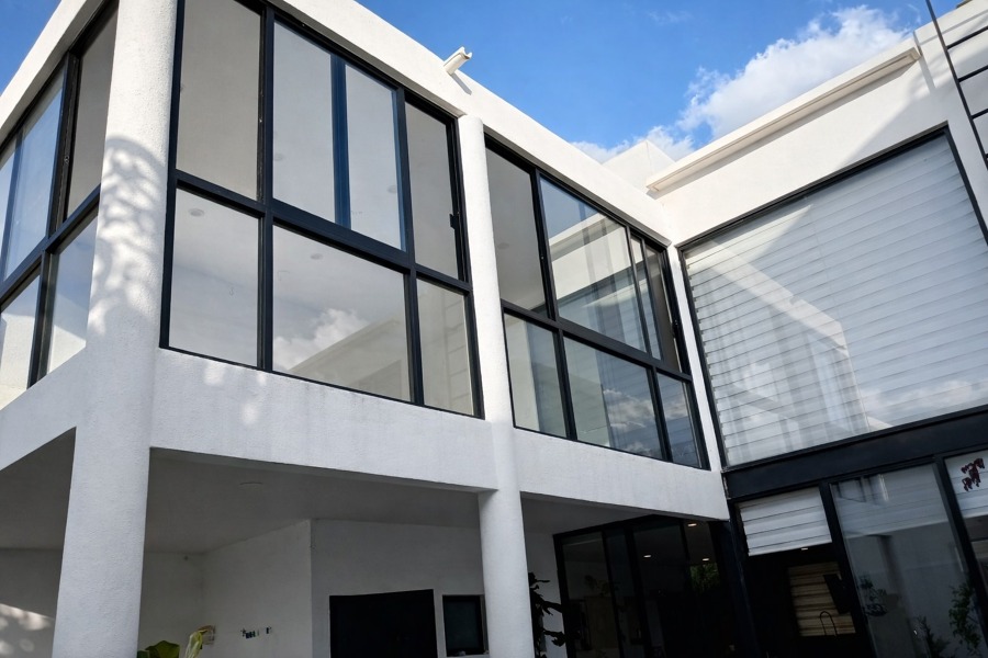 Cancel corredizo en aluminio color negro y cristal claro 6 mm