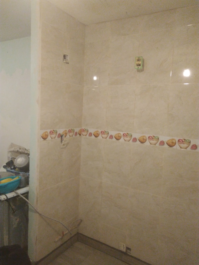 Colocación de azulejo en los heroes sección Flores 