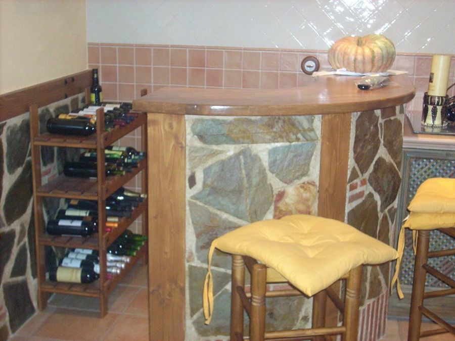 Barra de piedra semicircular