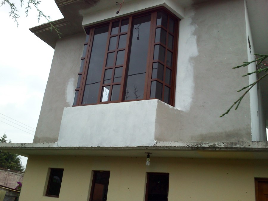 ventanas en corte diamante color nogal