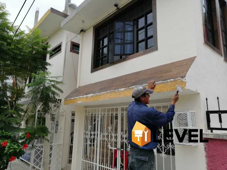 Colocación de loseta en fachada