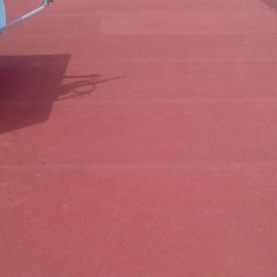 colocación de carpeta 4.00mm de espesor con refuerzo de poliester