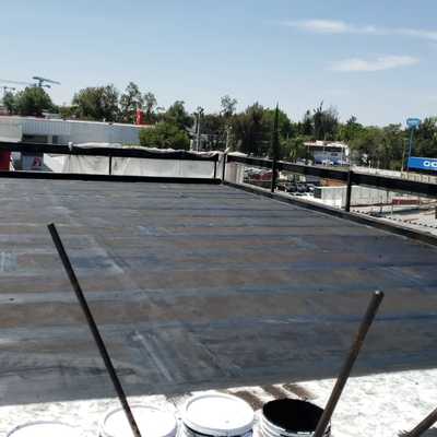 Colocación de Emulsión para el asfalto.