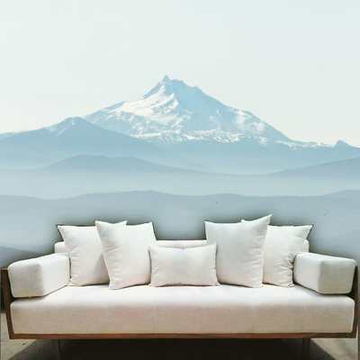 Sofá estilo escandinavo con Parota en los costados y en respaldo con patas de herrería acabado oxidado.