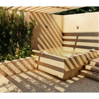 Espacio exterior con alberca moderna