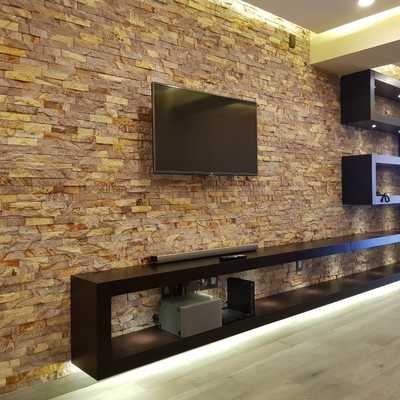 Fachaleta para estancia con diseño de centro de T.V.
