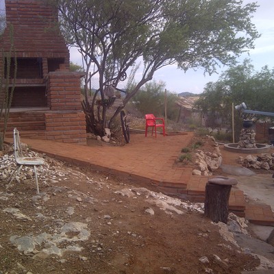 Asador,fuente,barra y patio