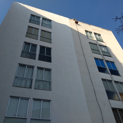 Recubrimiento de pintura en fachada