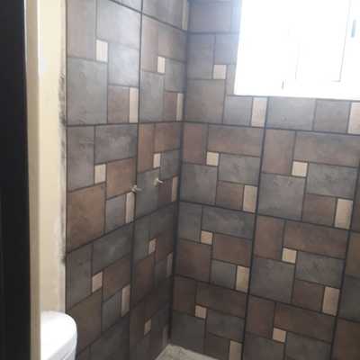 Colocación de loseta en muro