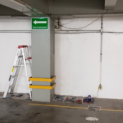 Reparación de Porosidad y Pintura de Muro de Concreto