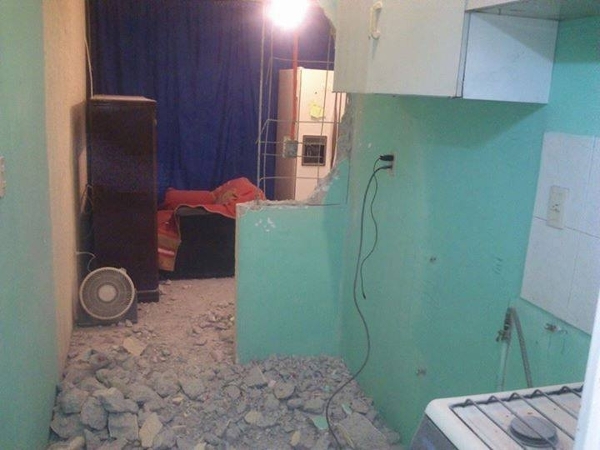 Remodelacion de cocina con un arco en la entrada