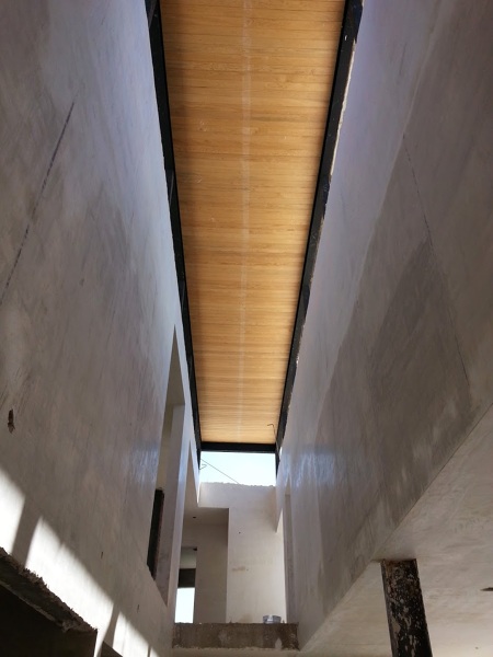 Foto: Terminación de Techo a Doble Altura en Acabado de Duela de Madera