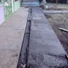 Cortar concreto, cavar 1.20mts y enterrar un ancla de concreto para poste de 8 metros