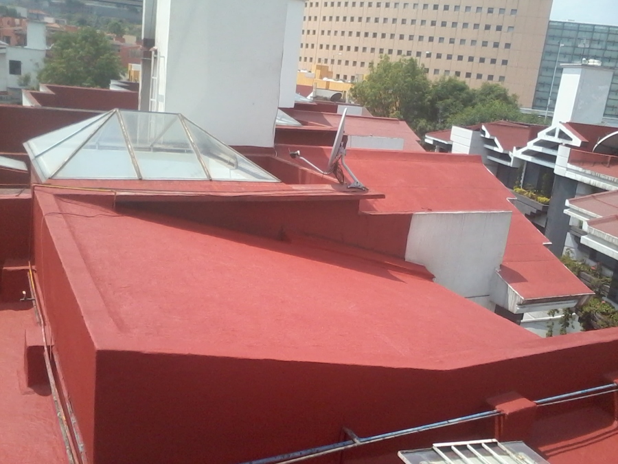 Aplicación de la segunda mano del impermeabilizante en acrilico.