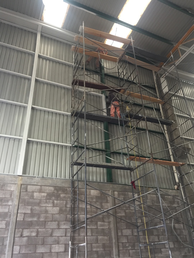 APLICACION DE PINTURA ESMALTE EN PERFILES ESTRUCTURALES LIGEROS Y SEMIPESADOS HASTA 15 MTS DE ALTURA