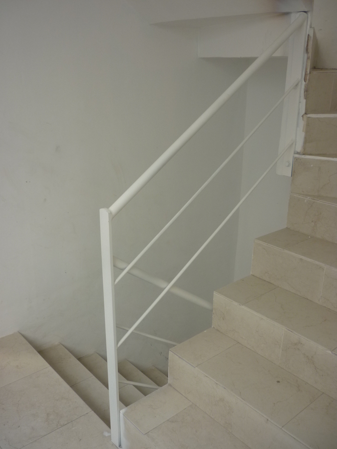 Barandal y piso de loseta