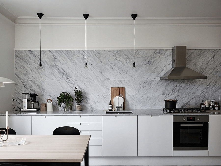 Foto: Cocina con Pared y Barra de Mármol #232746 - Habitissimo