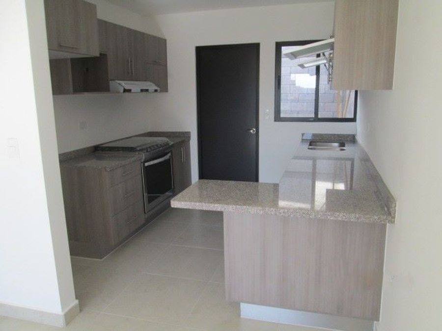 Cocina integral con cubierta de granito