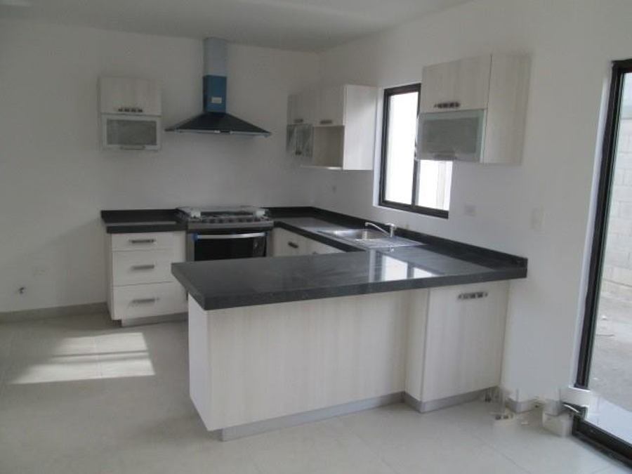 Cocina integral con cubierta de granito