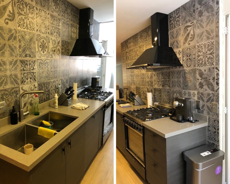 Cocina terminada con muro decorativo de fondo