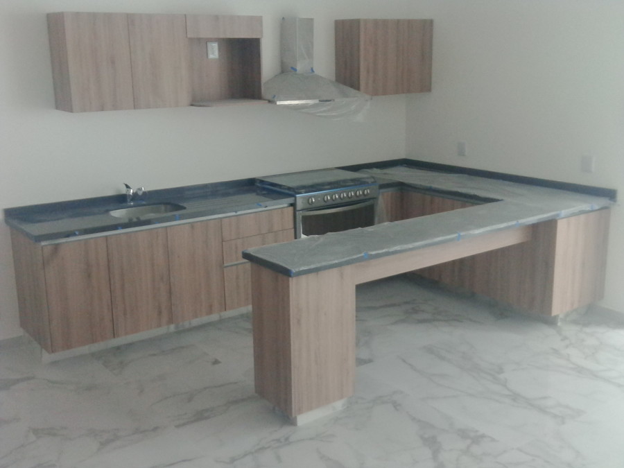 Colocacion de cubiertas de marmol.