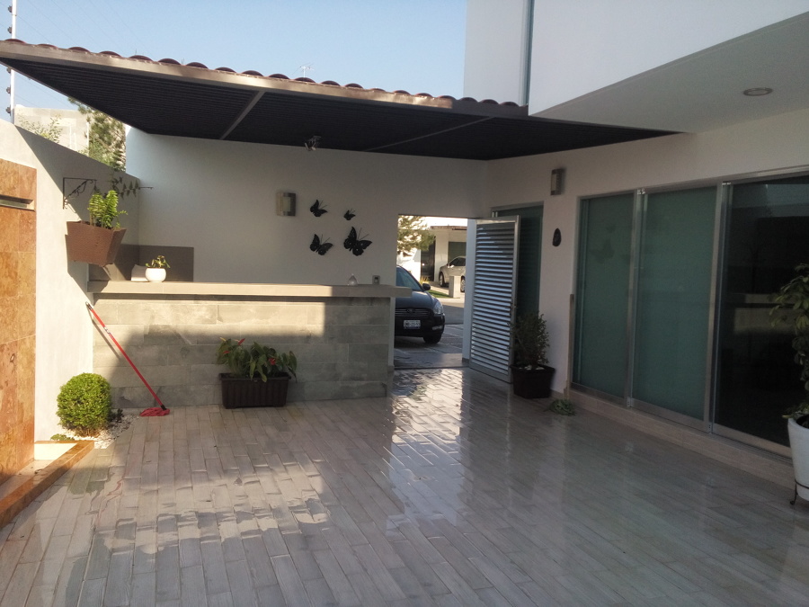 Colocación de lamina en pergolado, construcción de azador, ampliación de terraza con lozeta