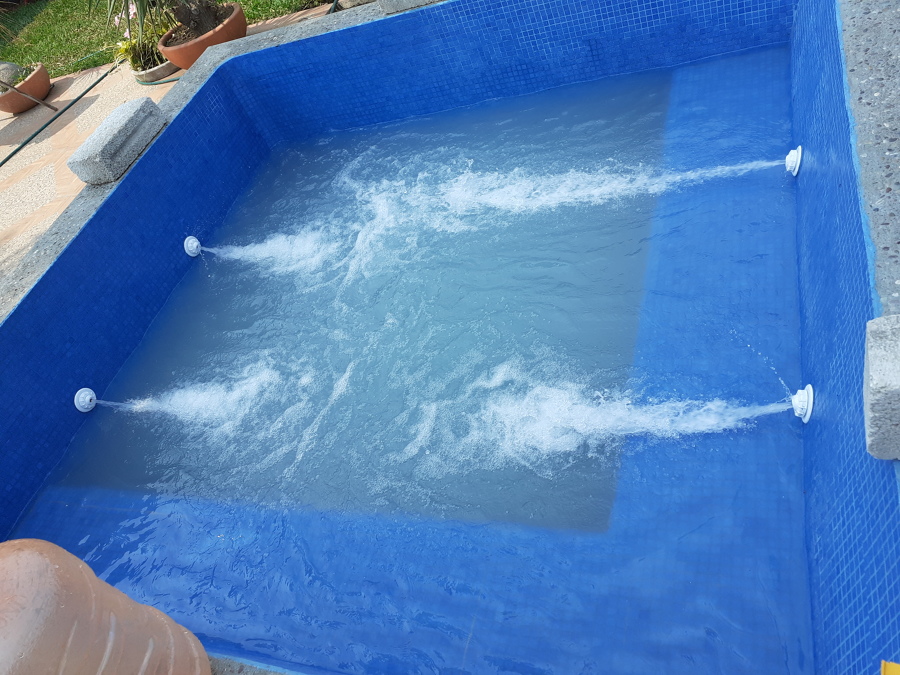 Construcción de alberca, revestimiento e instalación de sistema de filtración