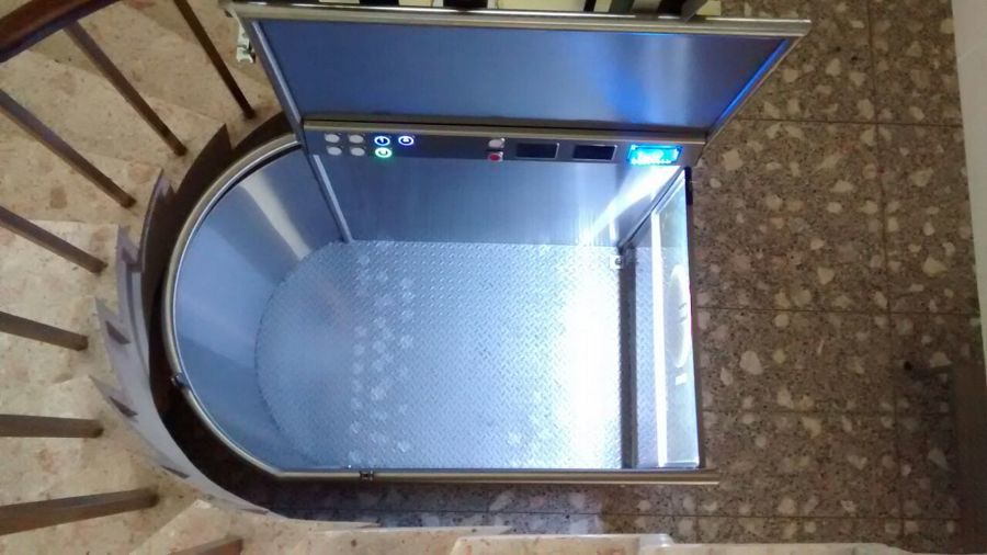 Elevador hidráulico de media cabina de fabricación nacional  para 2 niveles