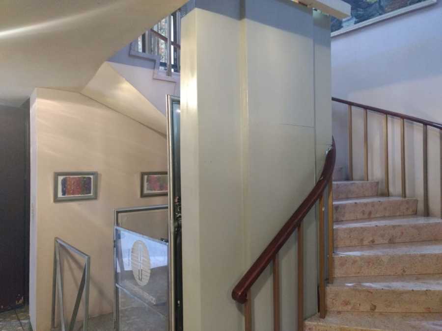 Elevador hidráulico de media cabina de fabricación nacional  para 2 niveles