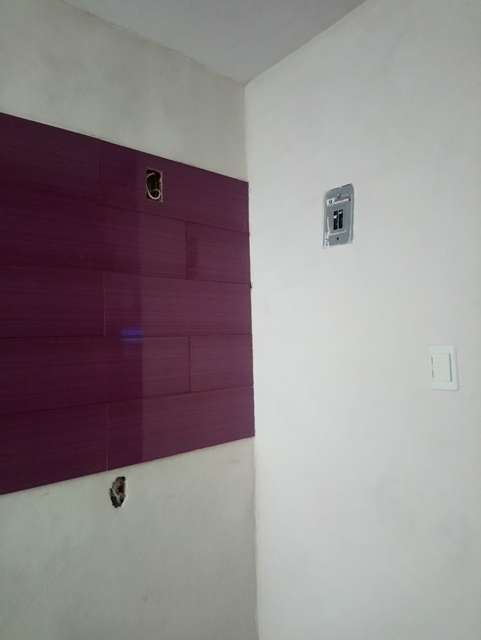 Estuco planchado en muros.