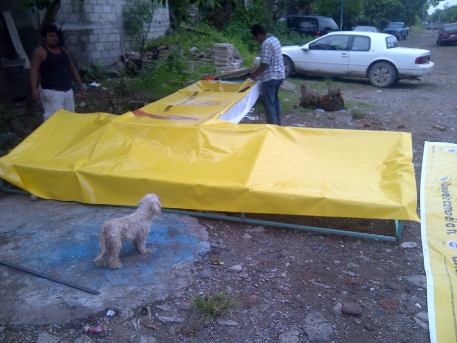 Fabricación de toldo y Adosado