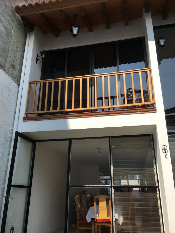 Fachada posteior, vista cocina, comedor