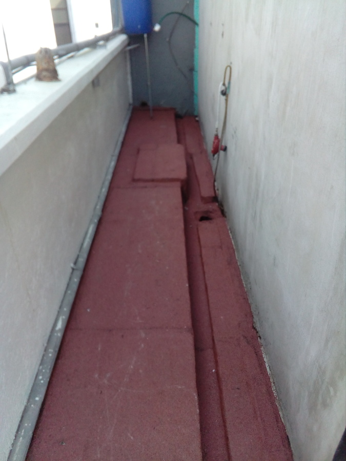 Impermeabilización con Prefabricado Copernit Italiano con gravilla roja en Azotea de Edificio.