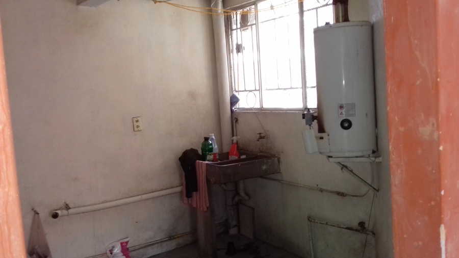 inicial en cuarto de lavado