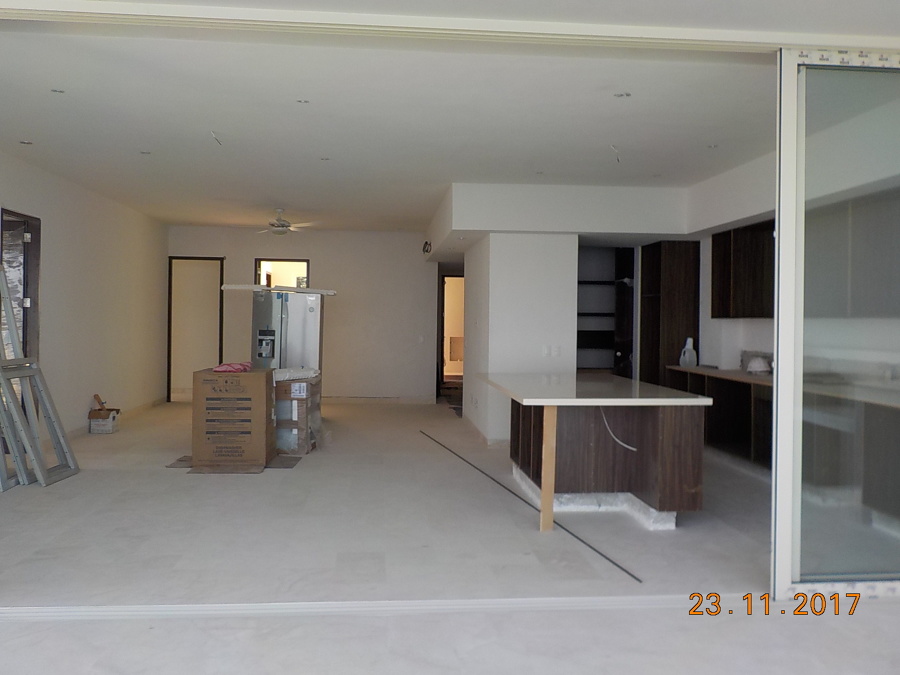 INTERIORES DE CONDOMINIO ZONA COCINA - COMEDOR