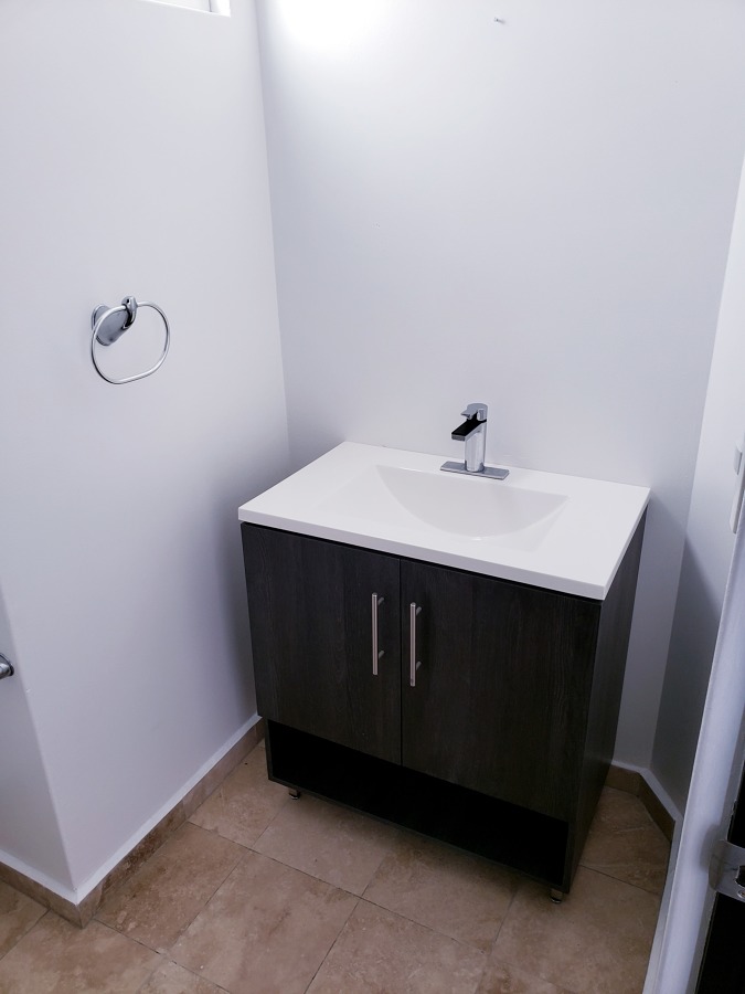 Medio baño.