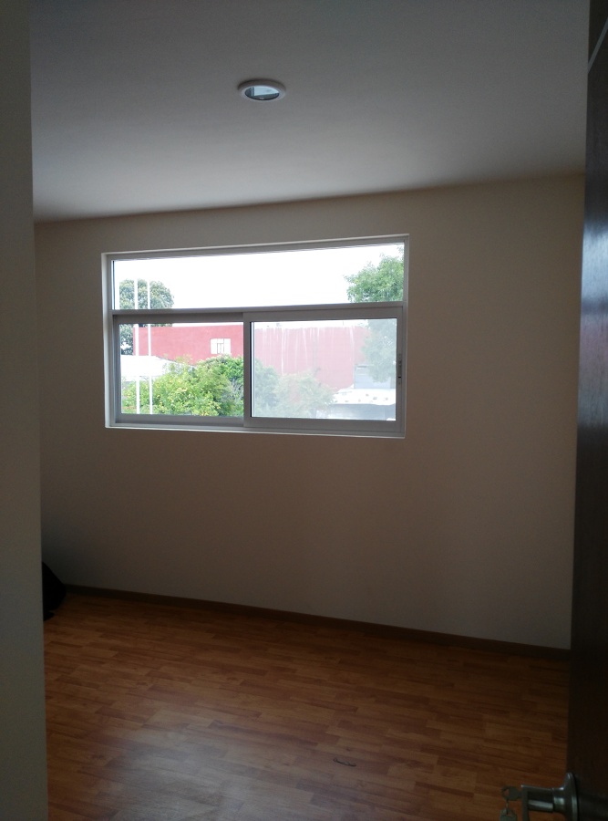 Recámara con piso laminado