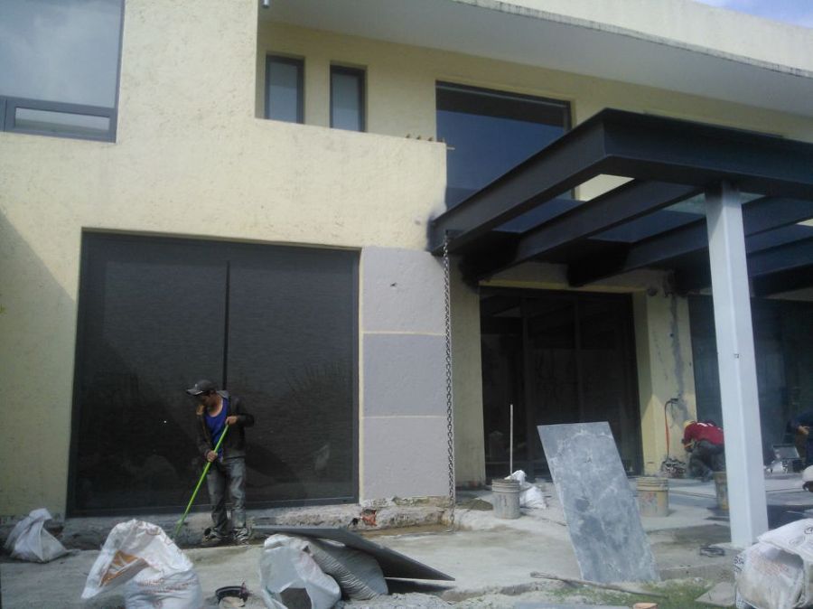 Remodelación de casa con pérgola