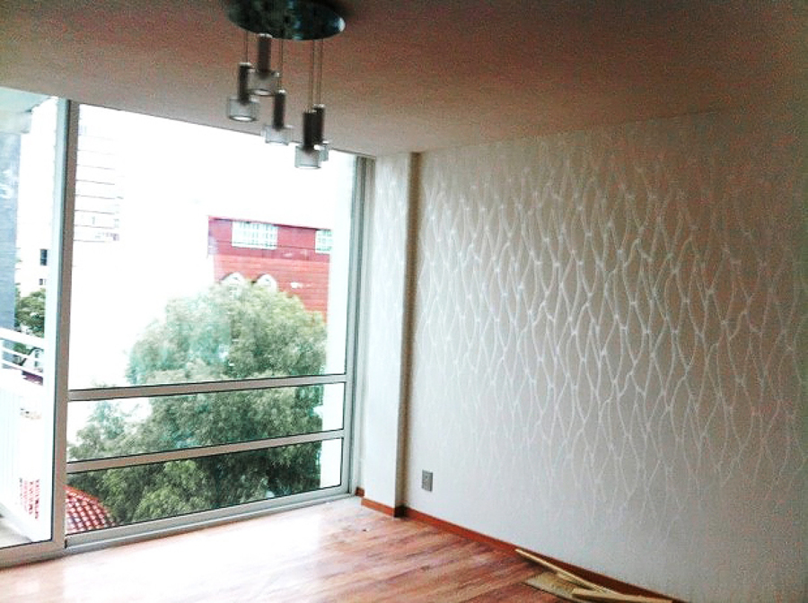 Tapiz , cancel y luminaria.