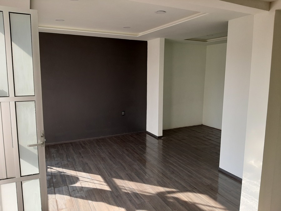 Vestidor y zona de cama.