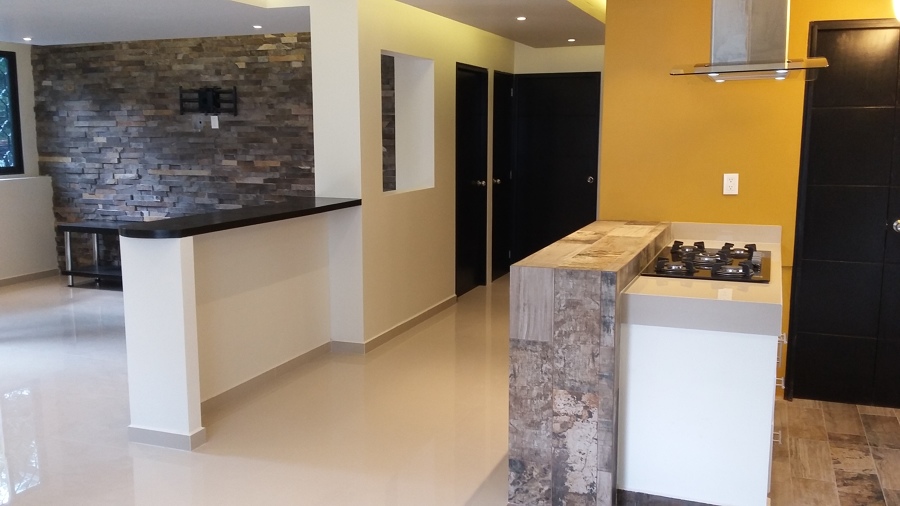 Vista de cocina y sala
