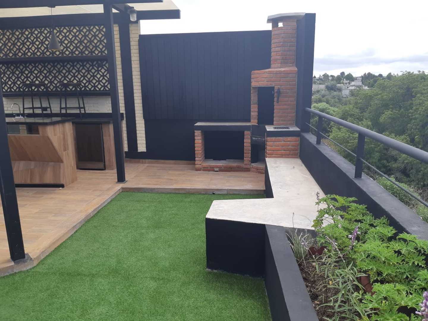 Área asador y descanso