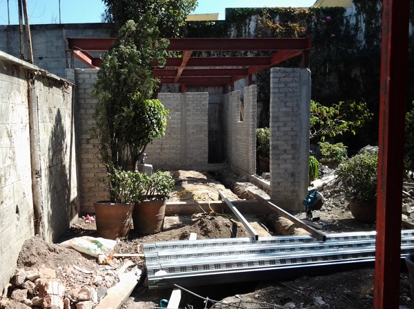 Ampliación para zona de juegos y asador 