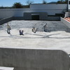 Aplicación de sellador en la superficie de concreto