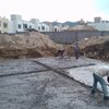 Construcción de alberca y área de asoleaderos