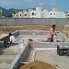 Construcción de alberca y área de asoleaderos