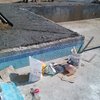 Construcción de alberca y área de asoleaderos