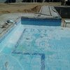 Construcción de alberca y área de asoleaderos