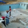Construcción de alberca y área de asoleaderos