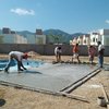 Construcción de alberca y área de asoleaderos